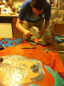 Clear view of the zombie side. That zombie has a bloody unicorn tail in his palm